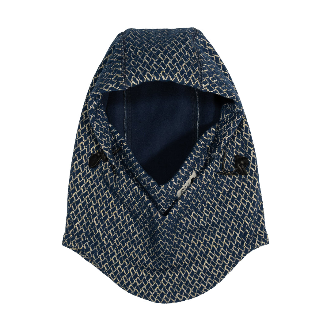 NOMADIK（ノマディック）| 777 JACQUARD HOODWARMER 2026 / BLUE/BEIGE