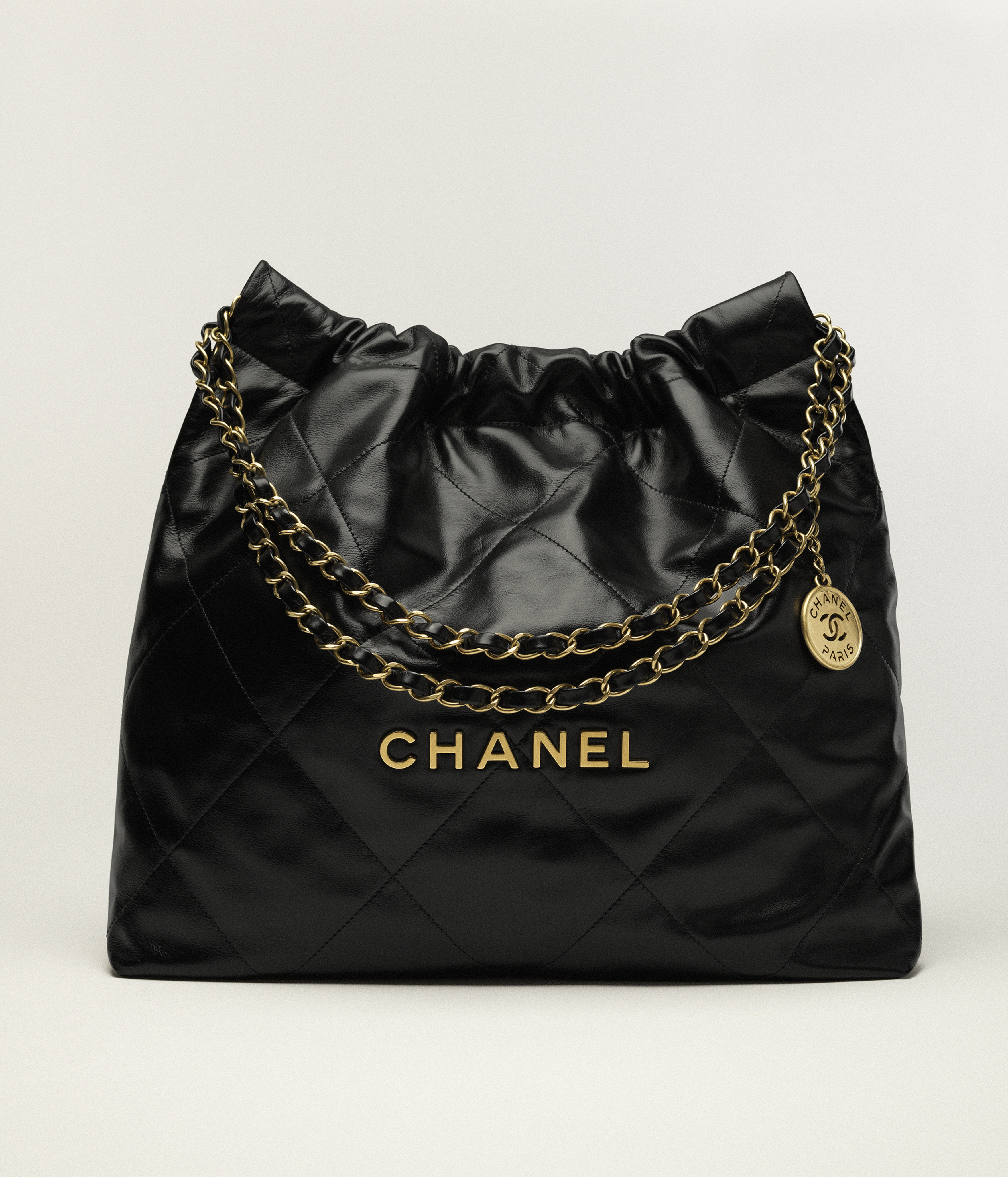 Chanel 22 handbag, Shiny calfskin & gold-tone metal , black