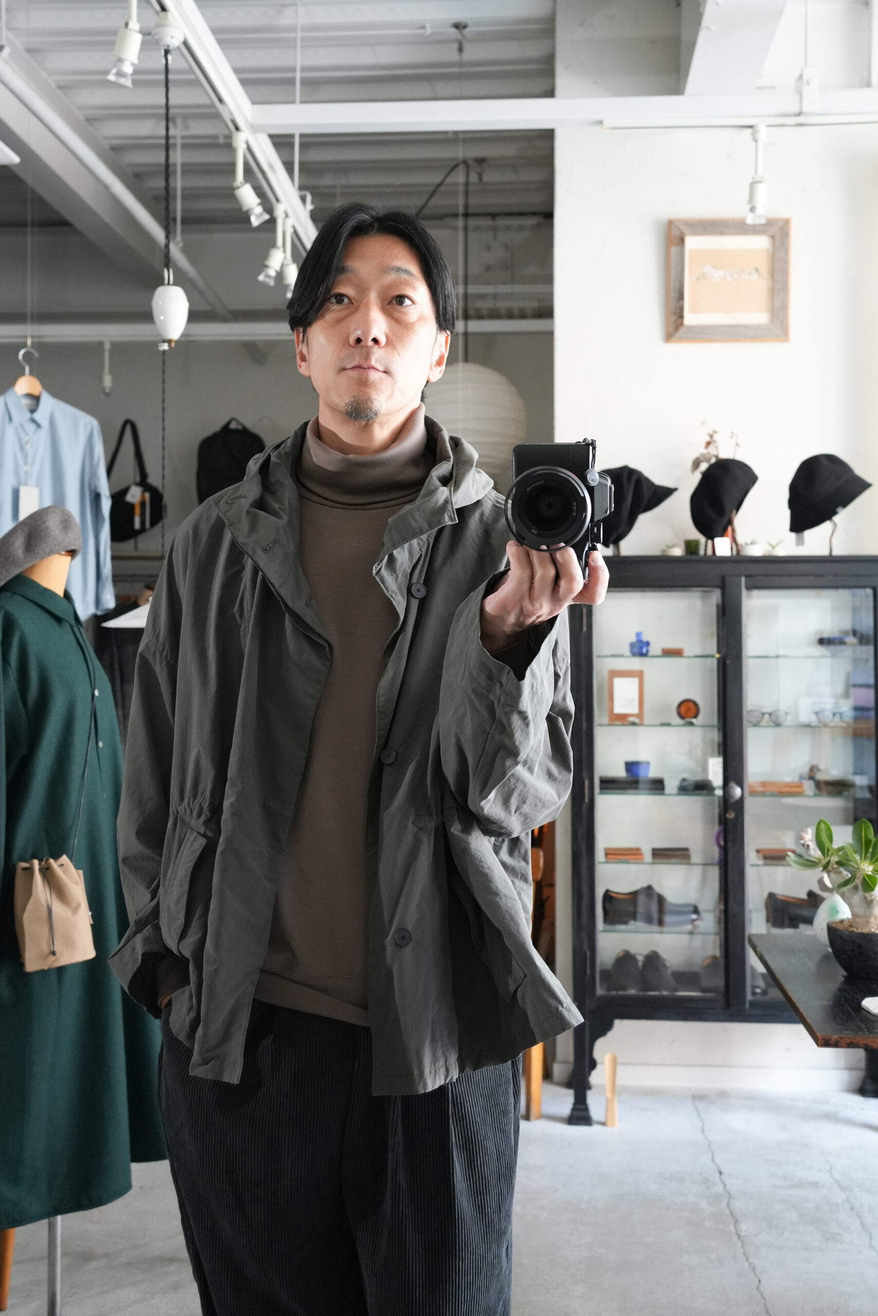 FIRMUM」ナイロンタッサーガーメントダイショートモッズコート