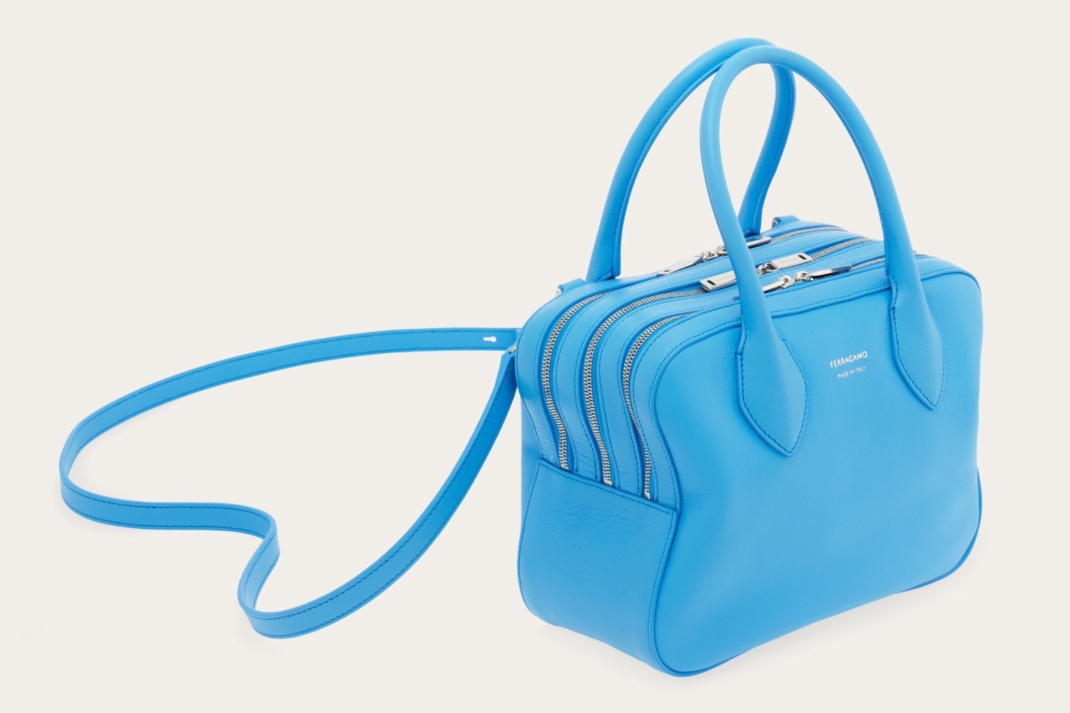 フェラガモ“星型”ウィメンズミニバッグ、ゴールドの3連ジップ×スカイ