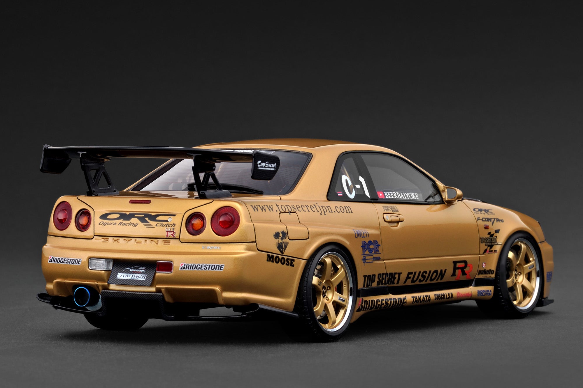 Ignition Model 1:18 Nissan Skyline 34GT-R (R34) TOP SECRET in Gold
