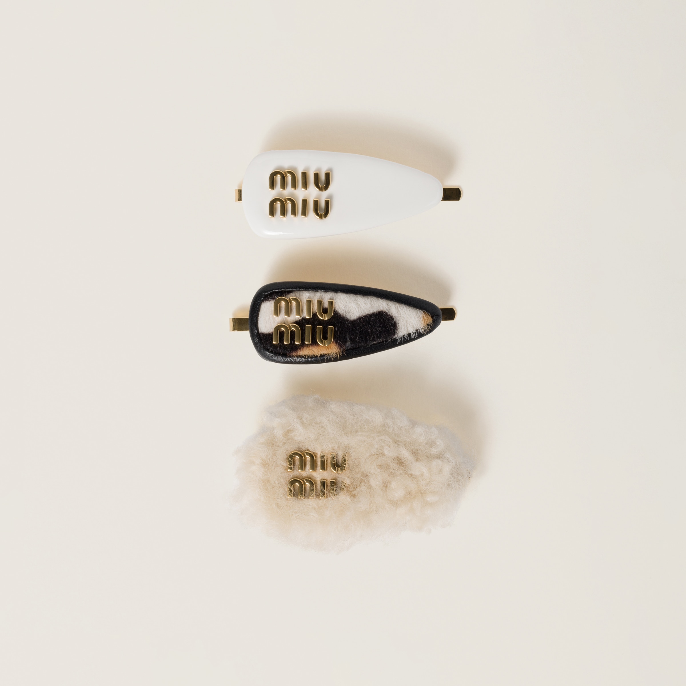 ブラック パテントレザー ヘアクリップ | Miu Miu