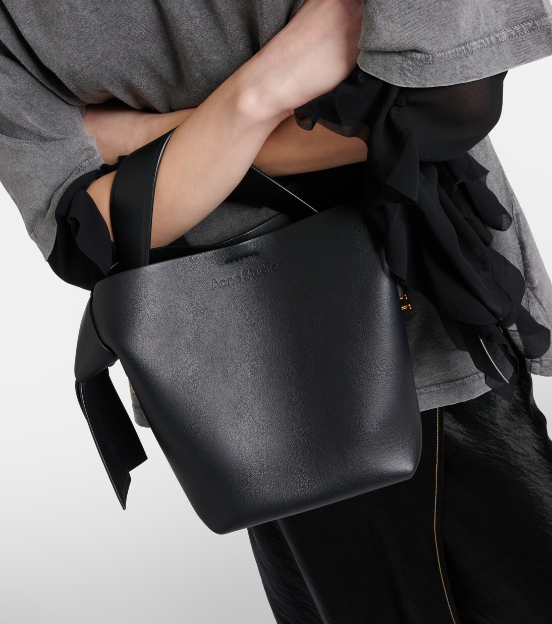 Musubi Mini leather shoulder bag in black - Acne Studios | Mytheresa
