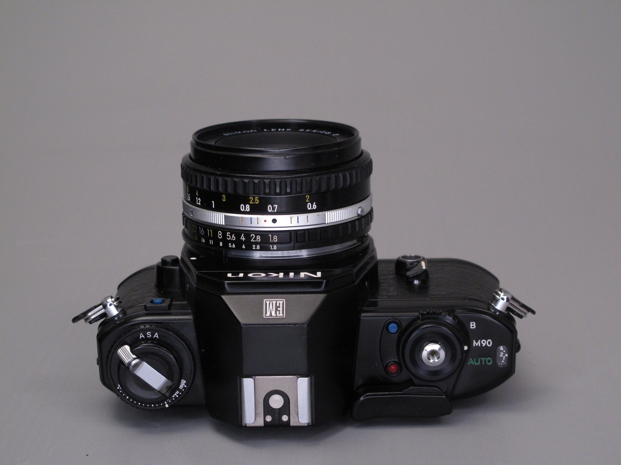 Nikon EM Camera with 50mm f1.8 lens and Flash – Phototek Canada