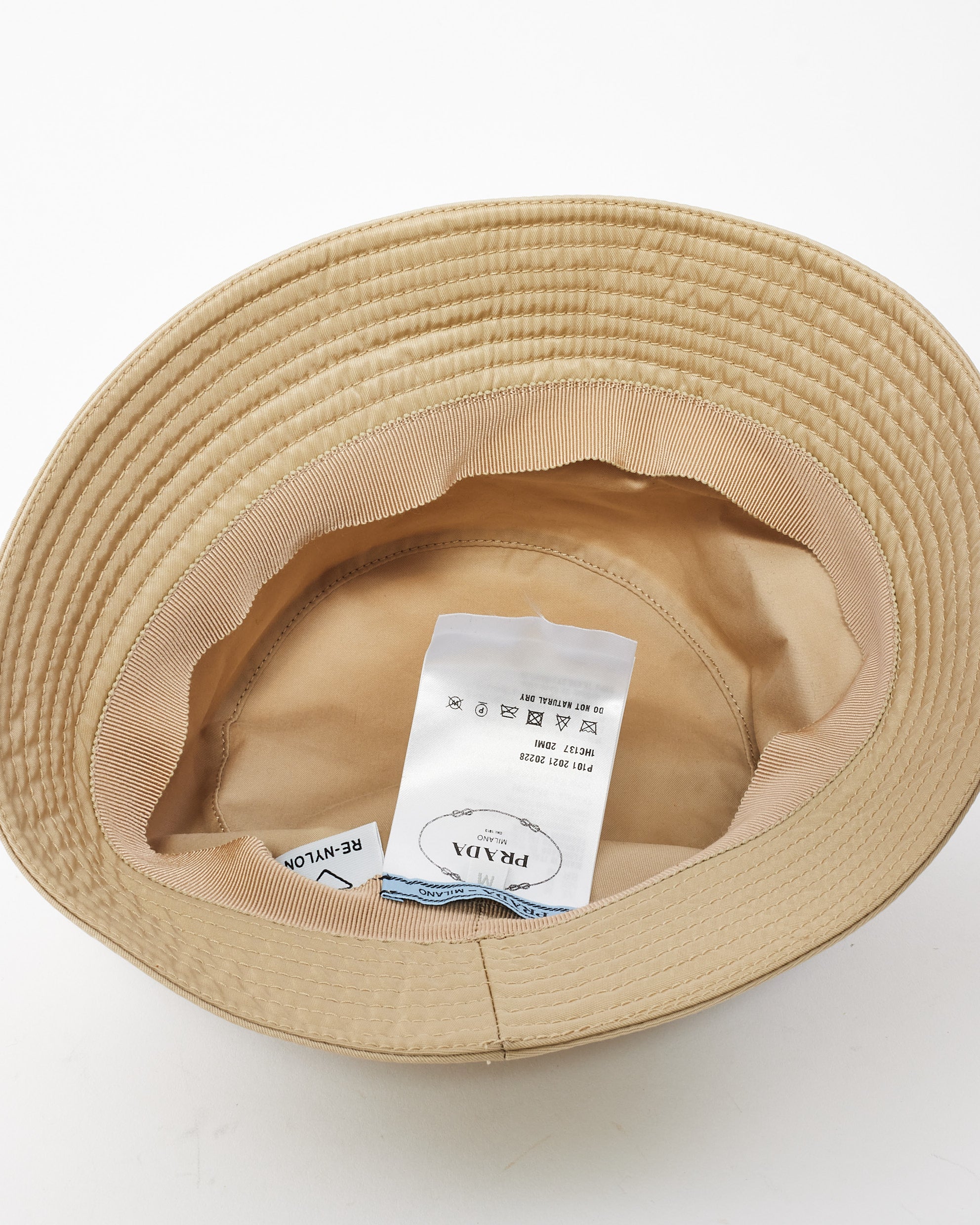 Explore a Prada Beige Nylon Bucket Hat - M - Authenticated Pre