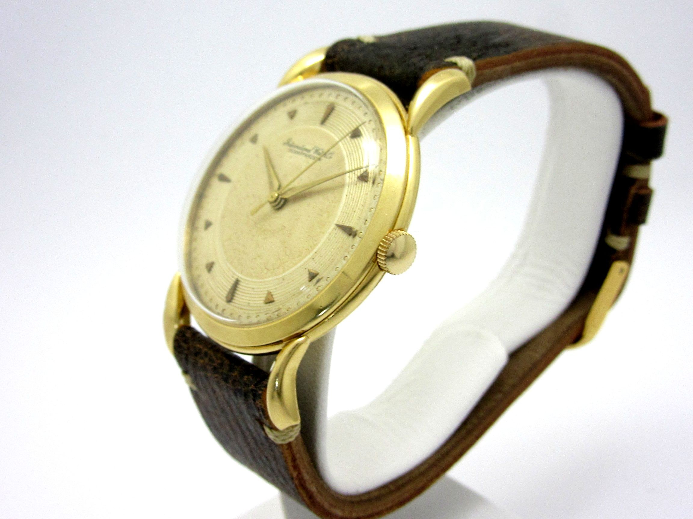 IWC (International Watch Company) ”K18YG無垢 手巻機械式ムーブCal