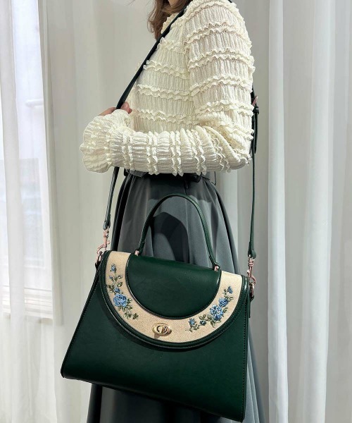 an another angelus（アンアナザーアンジェラス） ハンドバッグ