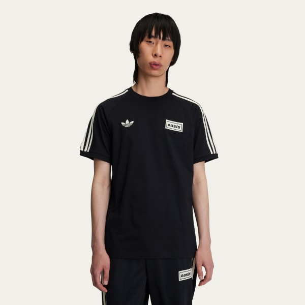 adidas Originals × Oasis ツアースリーストライプス Tシャツ