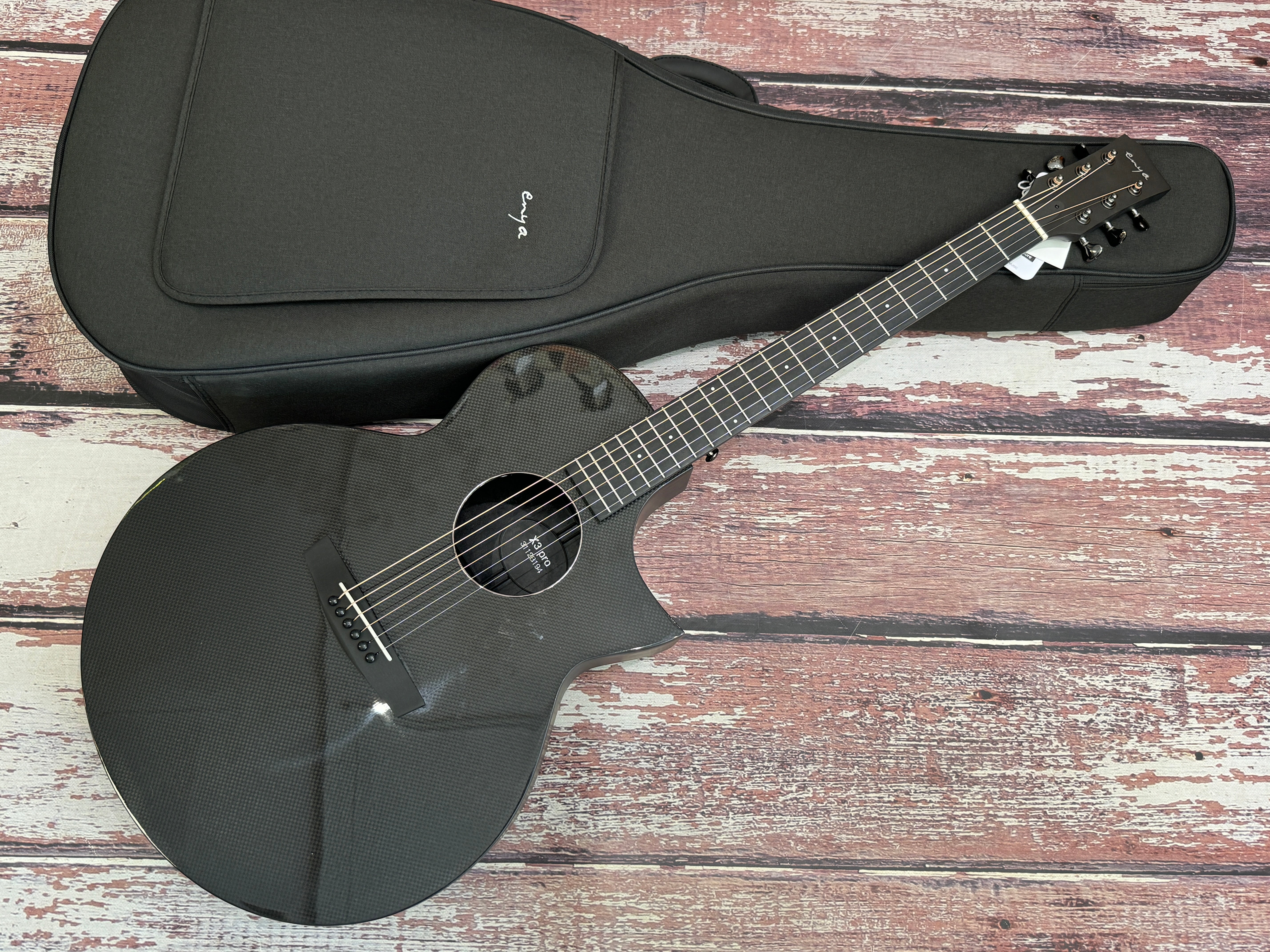 Enya X3 Pro Carbon electro with FX and padded bag. – Badlands