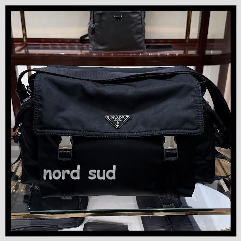 持ち方自由自在に PRADA エクスプローラ Re-Nylon レザー バック