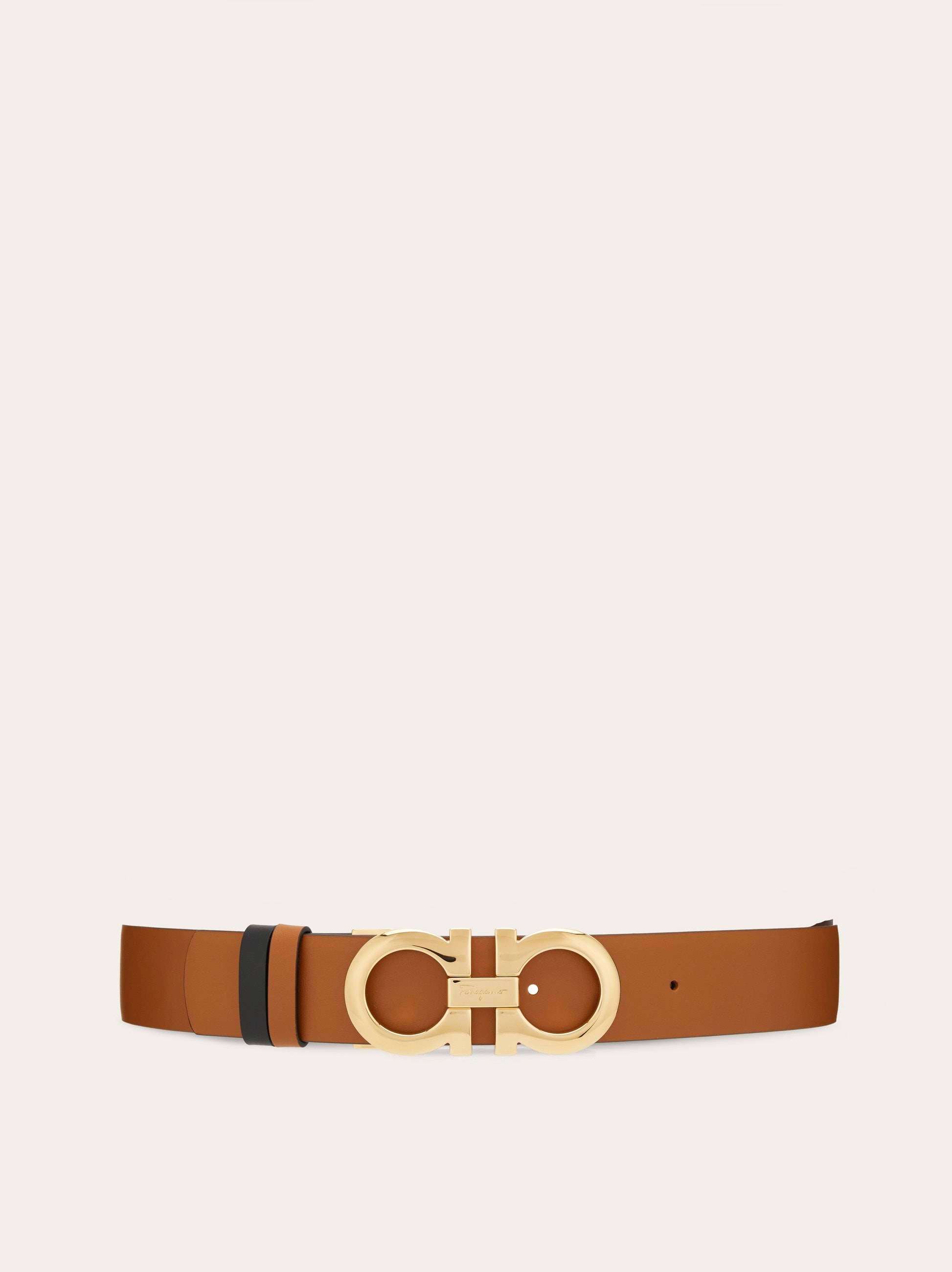 Reversible and adjustable Gancini belt - Women | Ferragamo