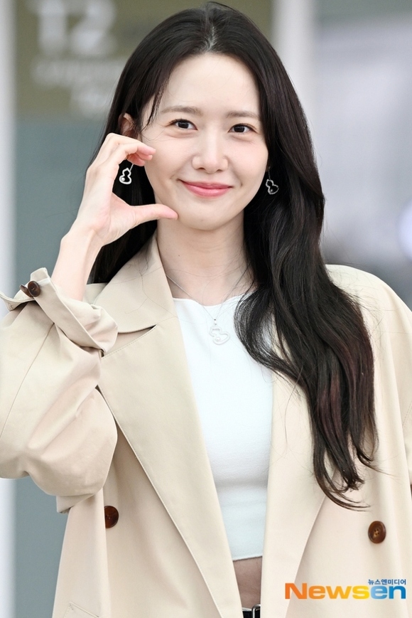 PHOTO】少女時代 ユナ、海外スケジュールのため中国へ…春らしい