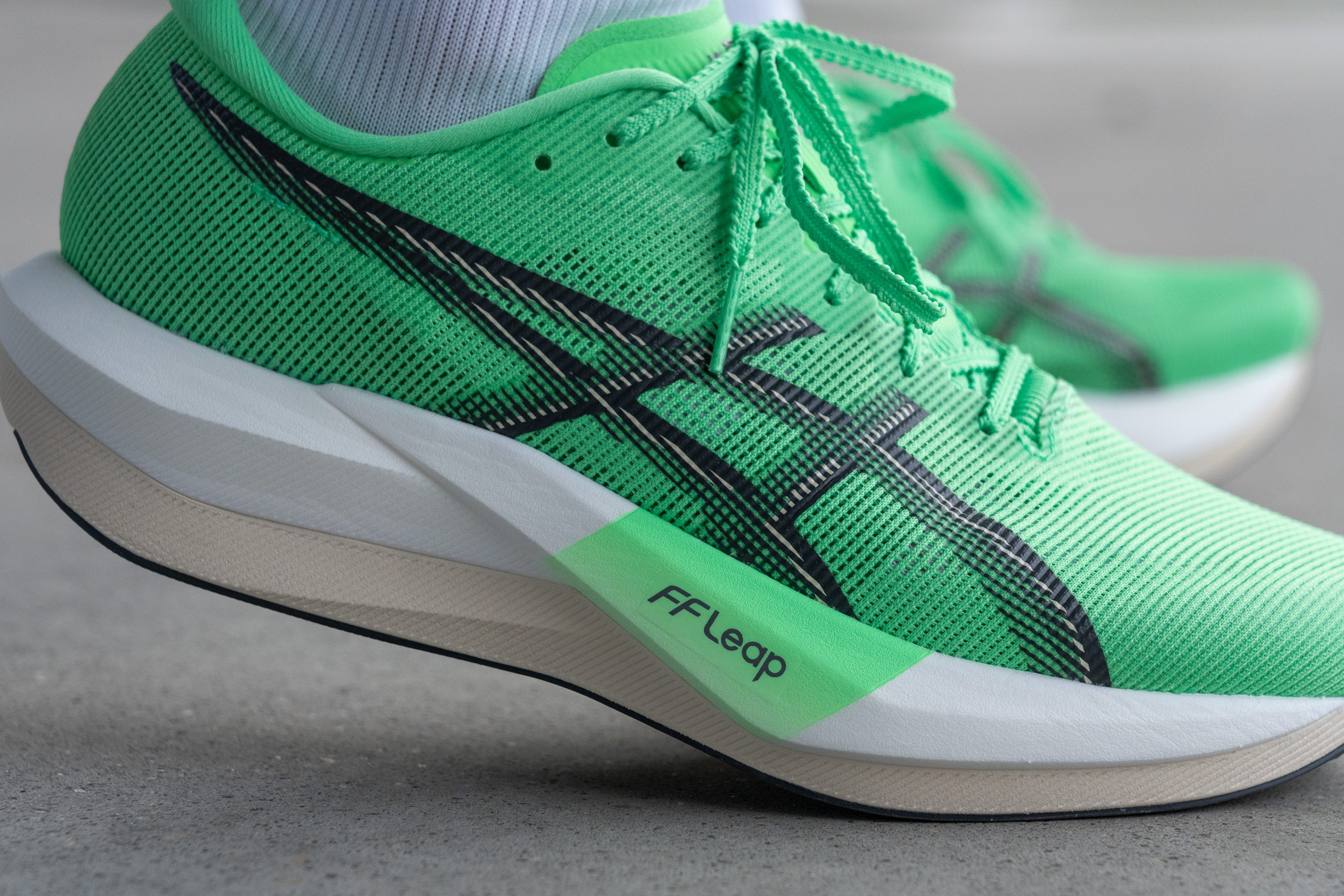 Cut in half: ASICS Magic Speed 5 Review (2026) | RunRepeat