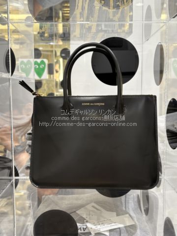 コムデギャルソン “HANDLES”黒-ポーチ型財布・クラッチバッグ