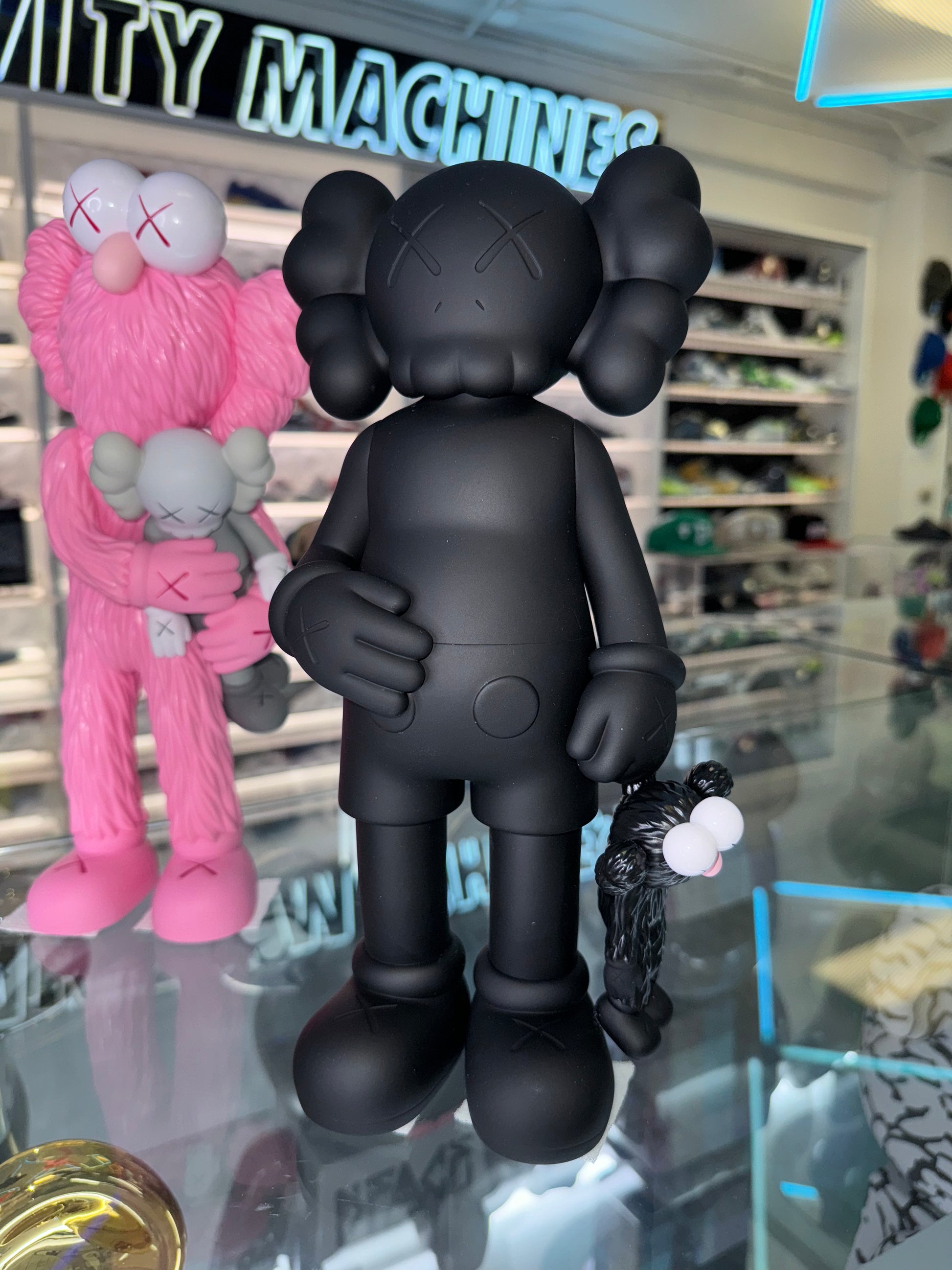 KAWS Share Vinyl Figure Black – Drexlers