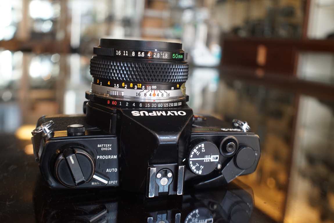 Olympus OM2 Spot/program w/ 50mm f/1.8 lens - Fotohandel