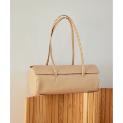 Whim Gazette(ウィム ガゼット)の【Hoaw.】横長シリンダーバッグ通販