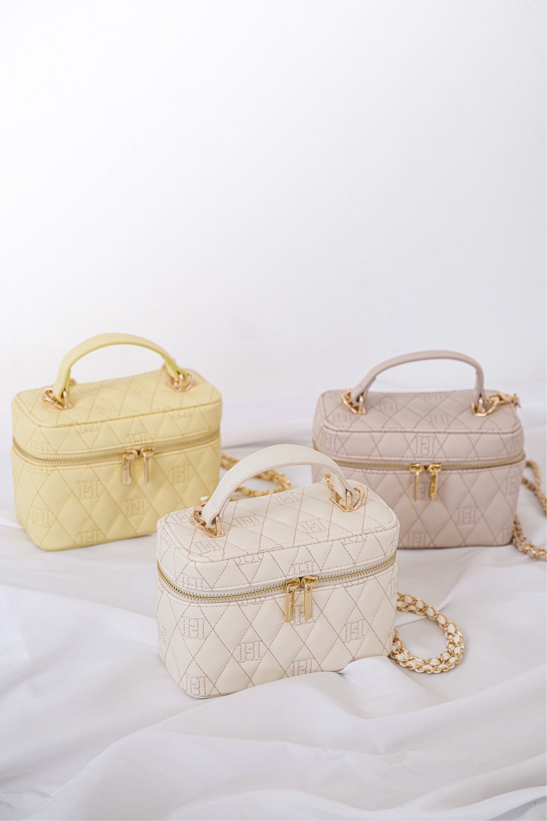 Monogram Quilted Vanity Bag