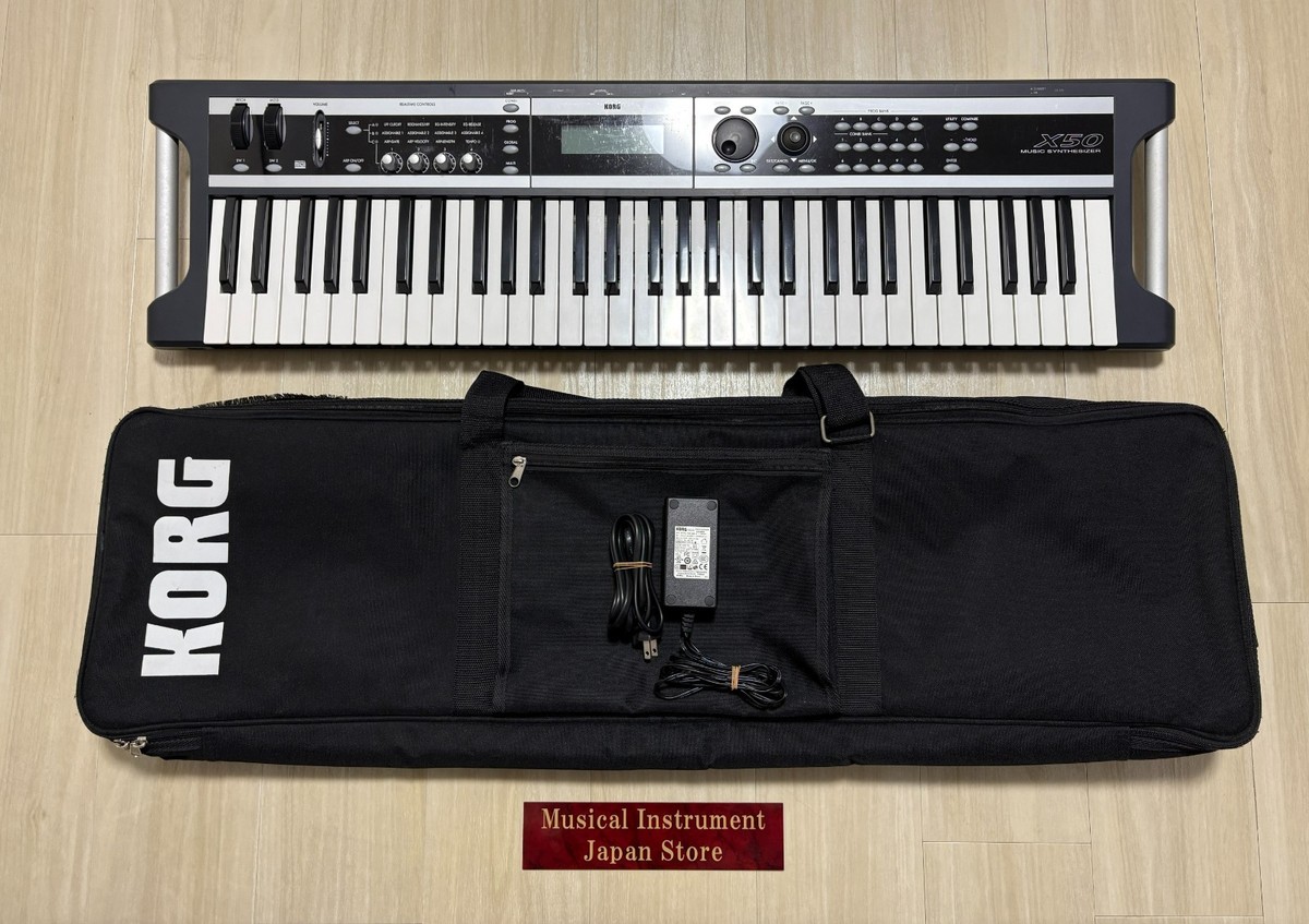 Korg X50 61-Key Keyboard Synthesizer with Soft Case and Adapter