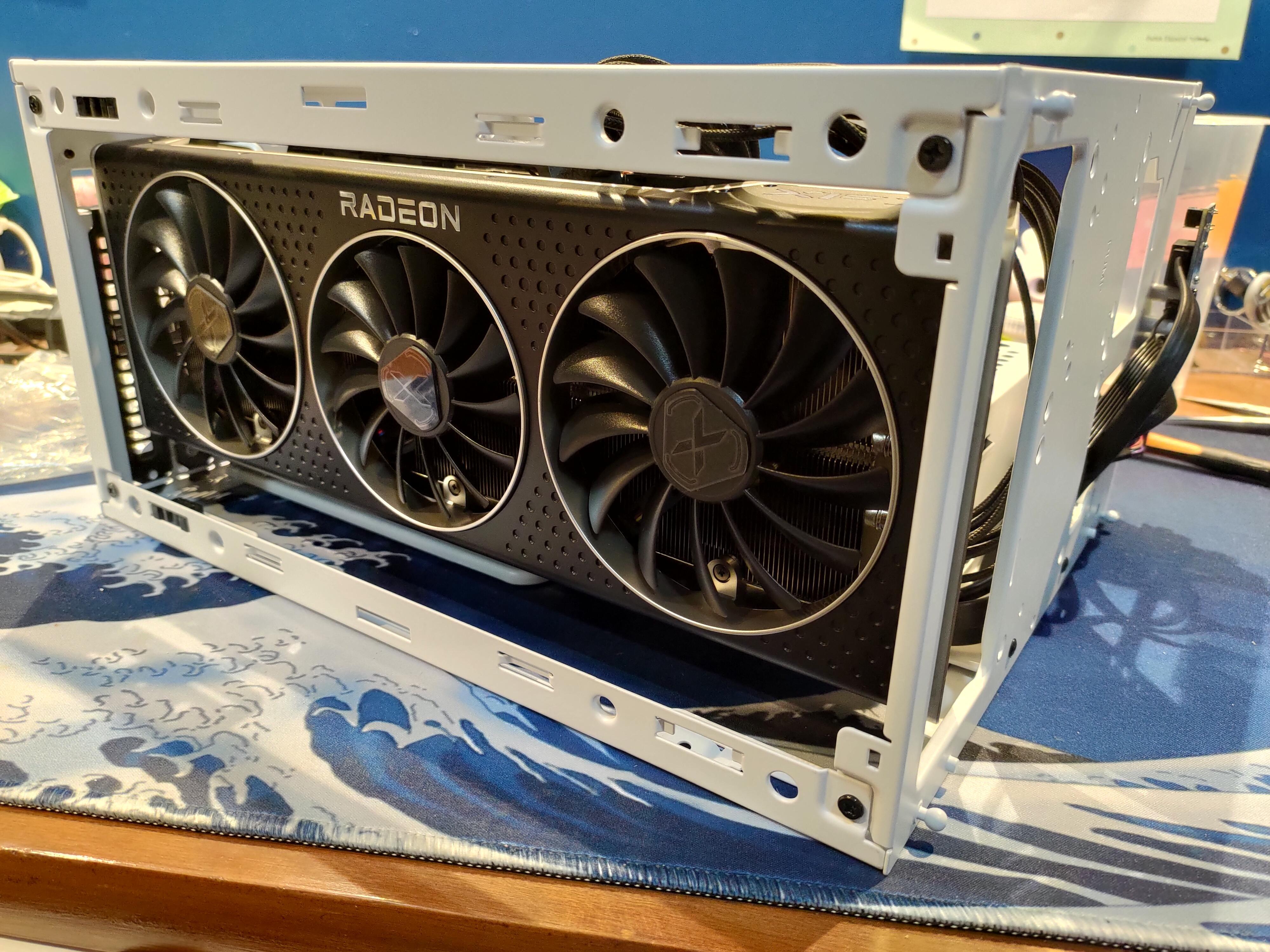 XFX Speedster Merc 319 inside the NR200. This card is 340mm long