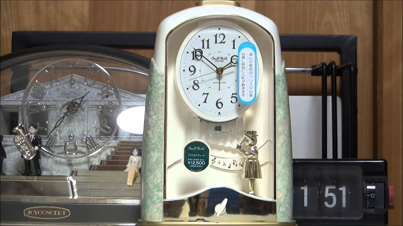 忙しく動く人形】RHYTHM からくり 目覚まし時計「スモールワールド