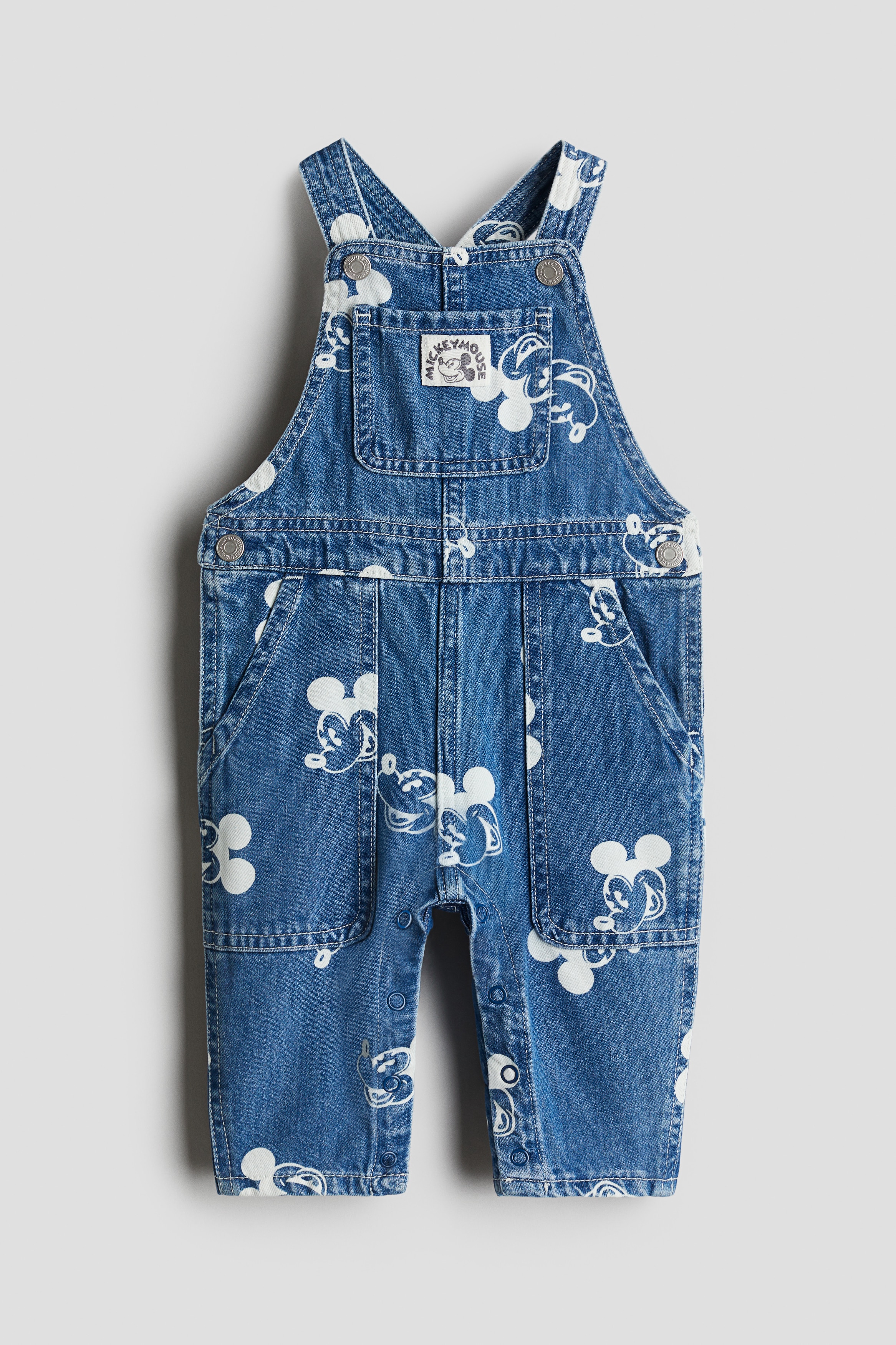 Printed denim dungarees - Denim blue/Mickey Mouse - Kids | H&M IN