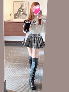 ブーツを使った「チェックミニスカート」の人気ファッション