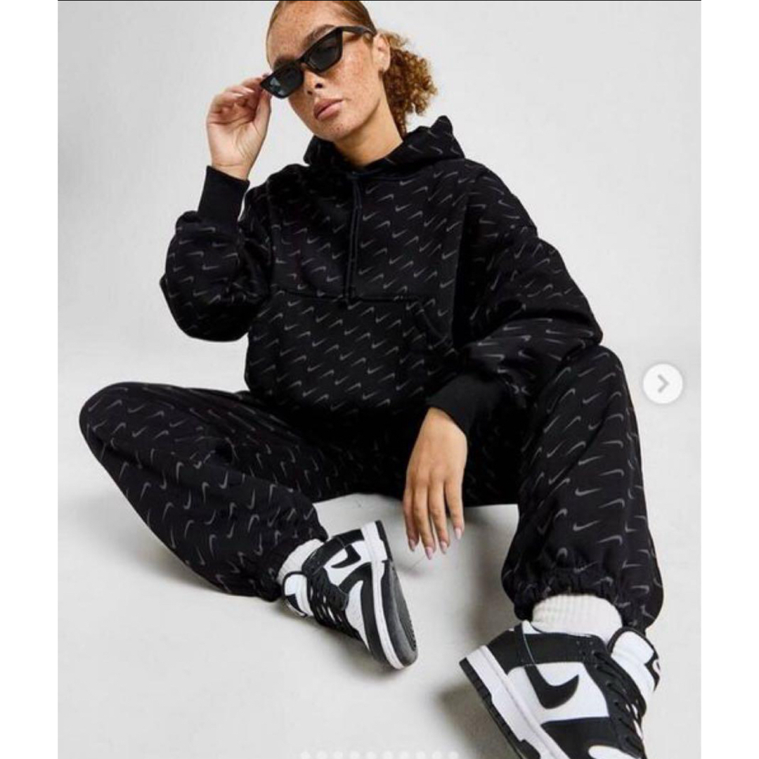 NIKE - ナイキ M レディース 上下 セットアップ スウッシュ 総柄の通販