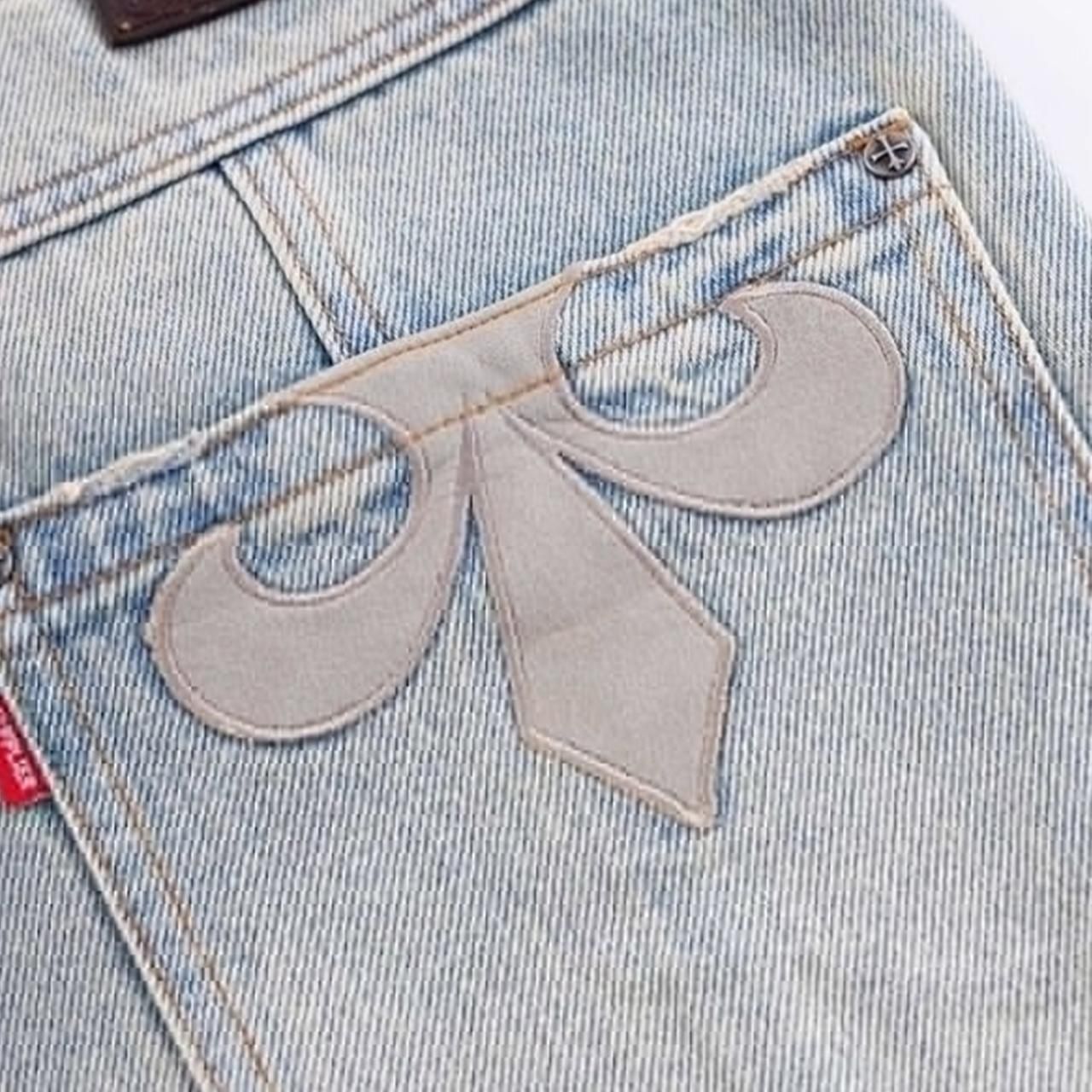 SUPPLIER (サプライヤー)｜クロスレザーパッチバギーデニムパンツ