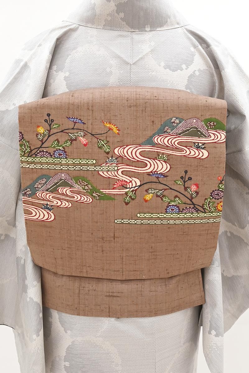 銀座【H-0742】紬地 紅型 染名古屋帯 橡色 花に風景文 - 銀座きもの