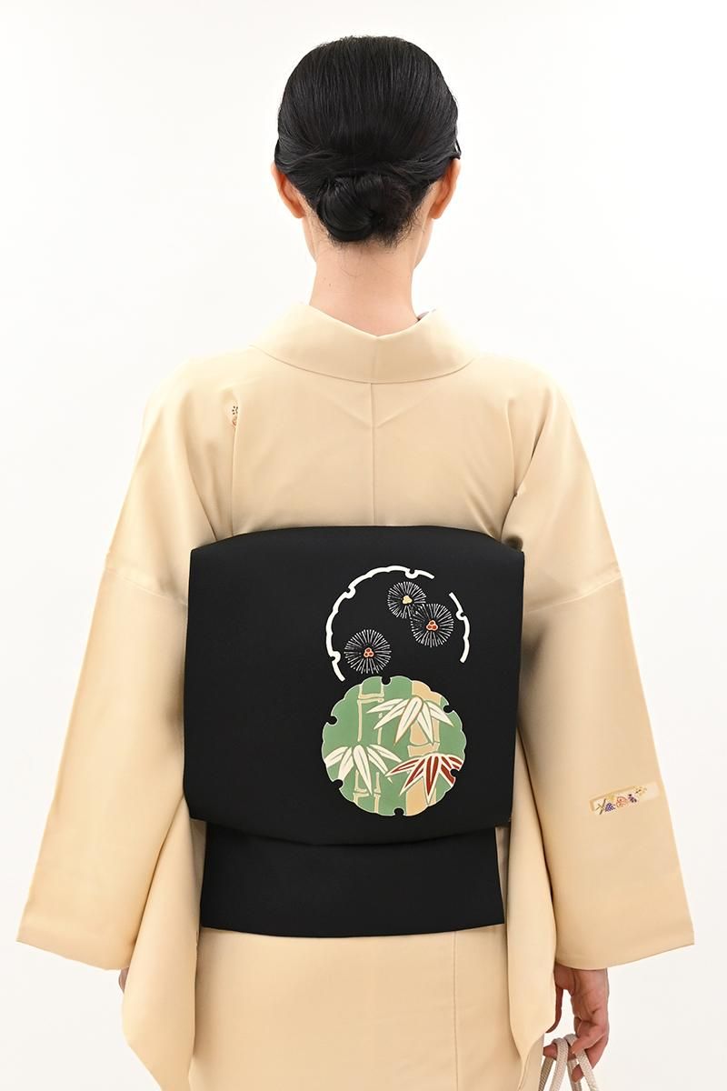 銀座【H-0892】塩瀬地 染名古屋帯 黒色 雪輪に竹や松の図（松屋扱い