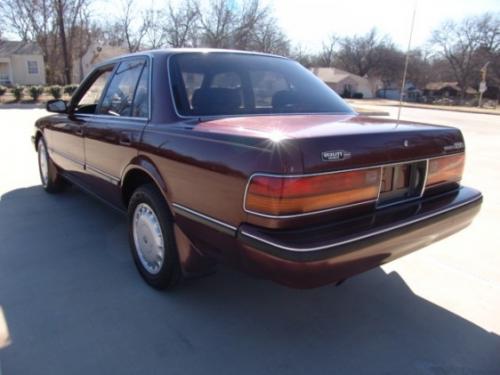 Dark Red Pearl Touchup Paint (3H3) for a 1989 Toyota Cressida