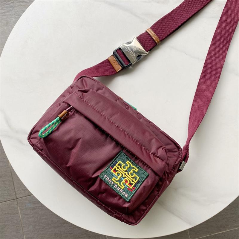 トリーバーチボディバッグリップトップ クロスボディ保存袋付き