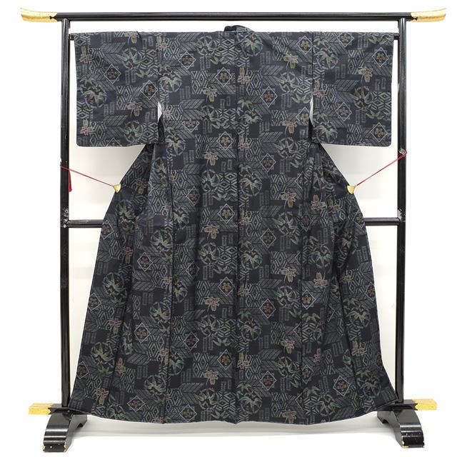 本場大島紬 袷 着物 織絣 横双 手織り 正絹 黒 花 笹 色紙文様