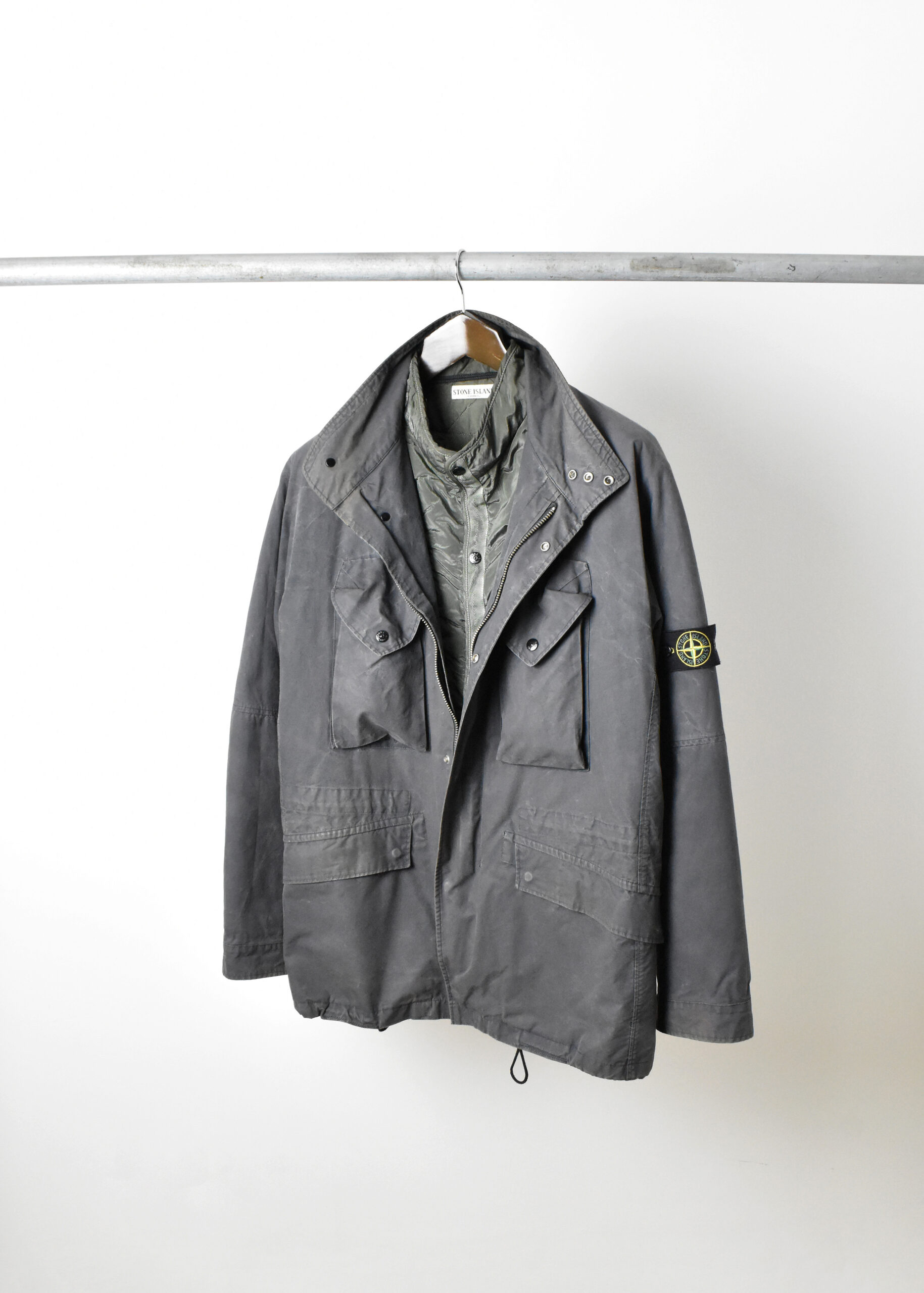 AW04 STONE ISLAND DUAL LAYER MULTI POCKET WEATHERED-CANVAS JACKET