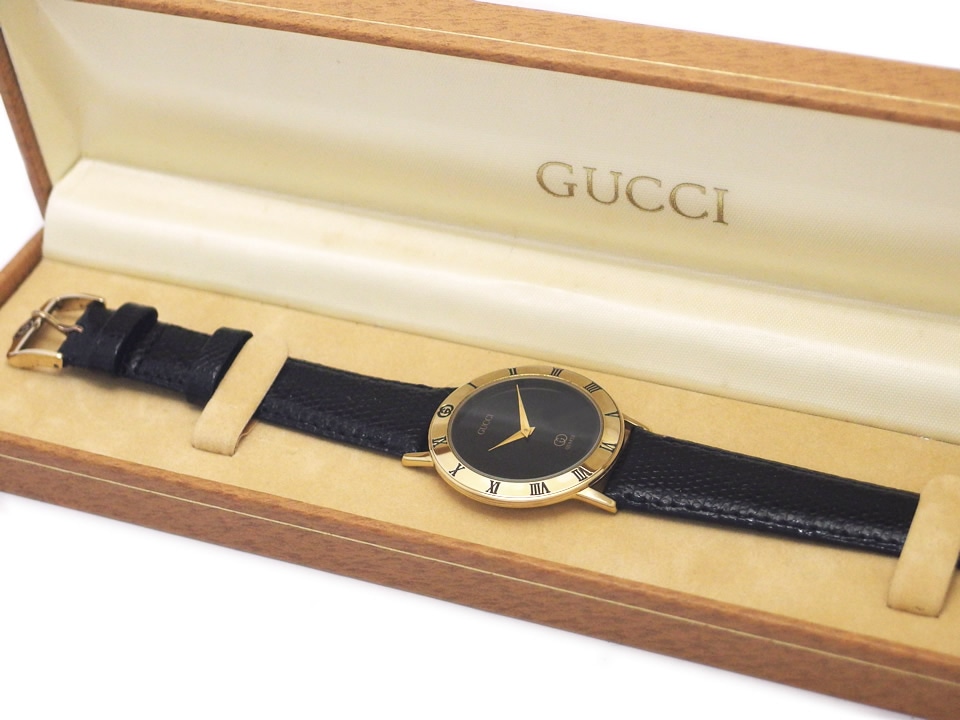 グッチ 3001M スイス製 メンズ 黒文字盤 GP クオーツ 1990年頃 USED Gucci