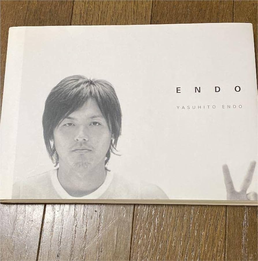 Amazon.co.jp: 遠藤保仁選手直筆サイン入写真集 : おもちゃ