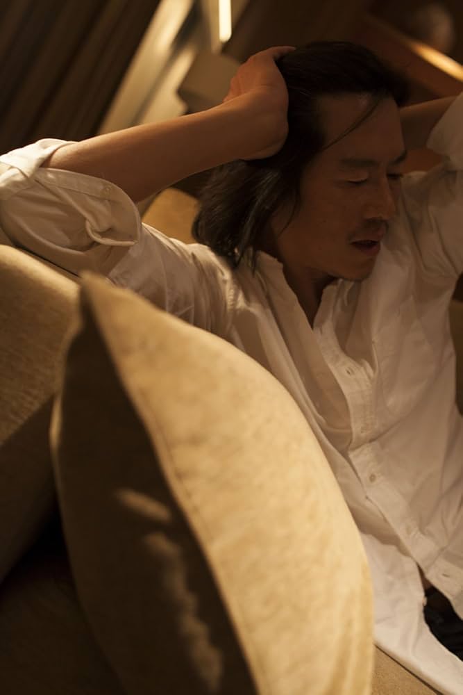 Amazon.co.jp: 豊川悦司 蜷川実花 : 蜷川実花: 本