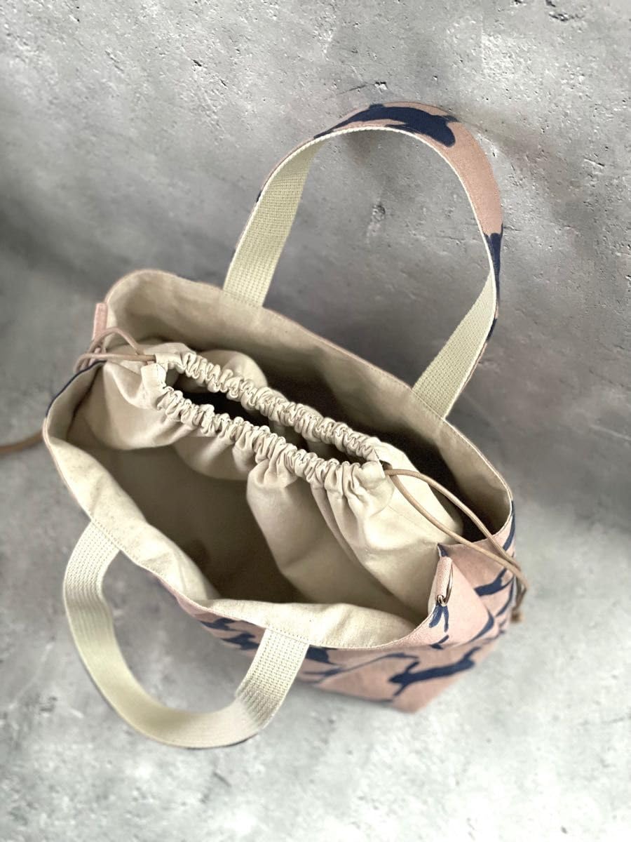 Amazon.co.jp: ミナペルホネン runrunrun pink あおり巾着トート