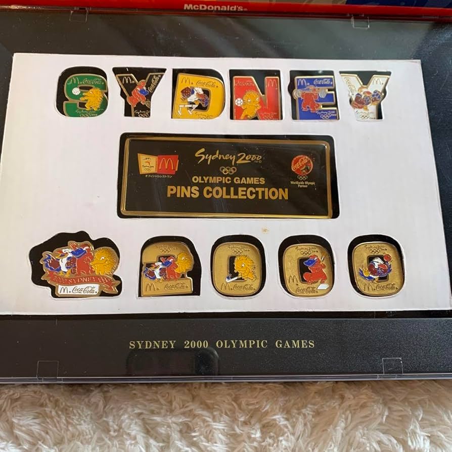 Amazon | 2000シドニーオリンピック マクドナルド ピンバッジ | バッジ