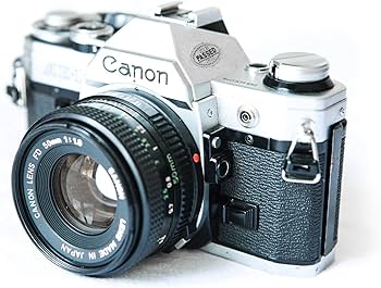 Amazon | Canon AE-1 35mmフィルムカメラ 50mm 1:1.8レンズ付き