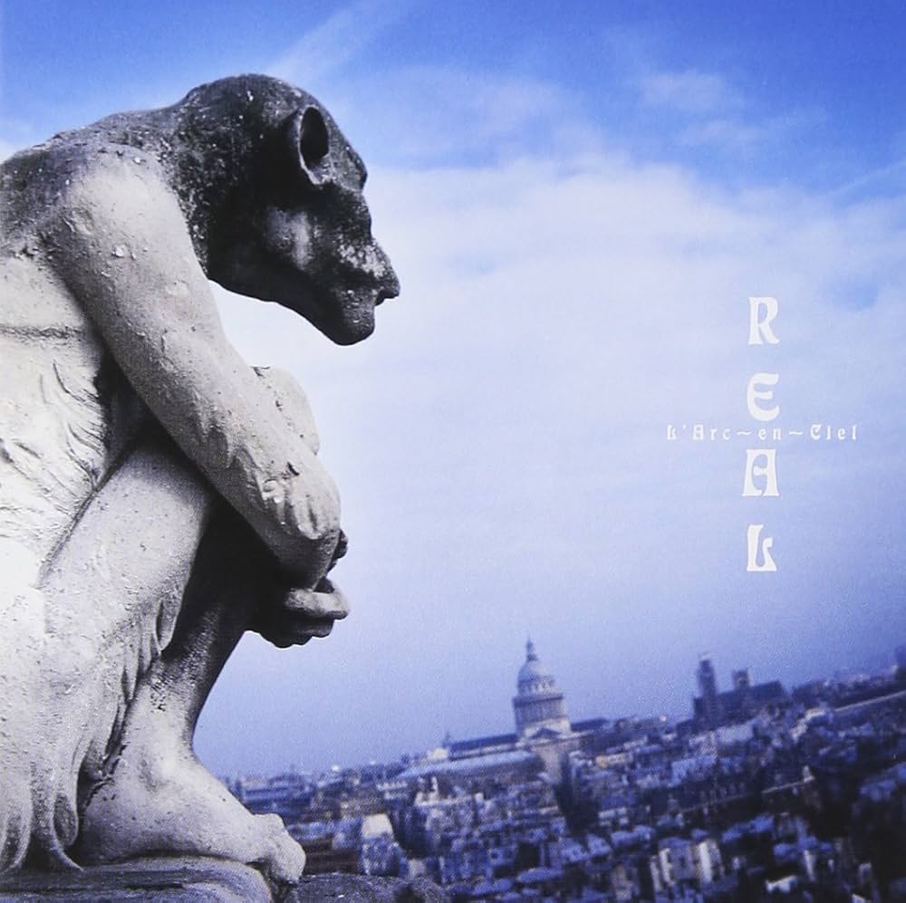 Amazon.co.jp: REAL: ミュージック