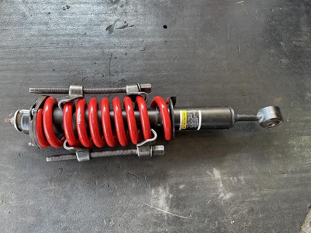 滋賀オートライフハノ GRハイラックス(125系)のリフトアップスプリング