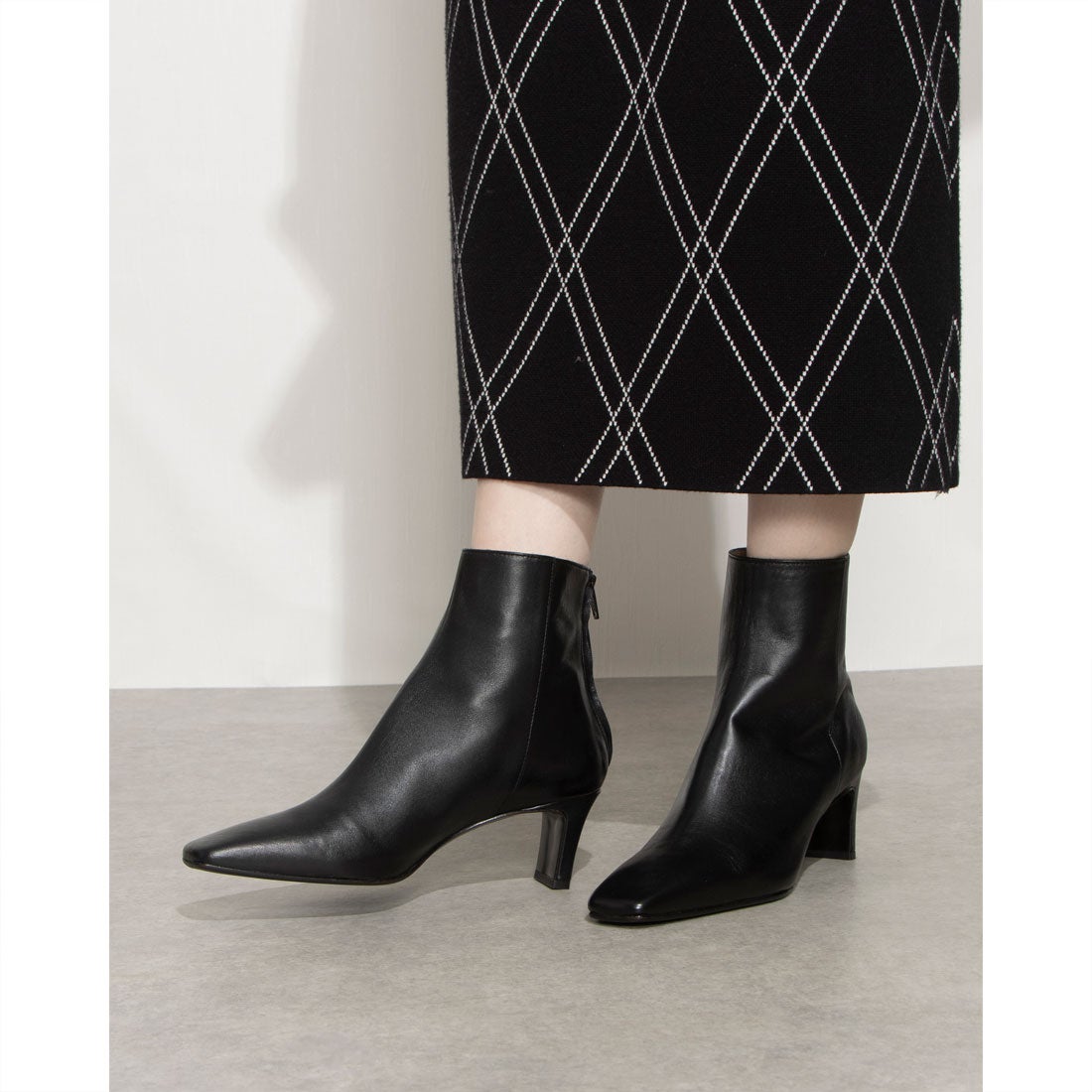 ファビオルスコーニ FABIO RUSCONI セットバックヒールバックジップ