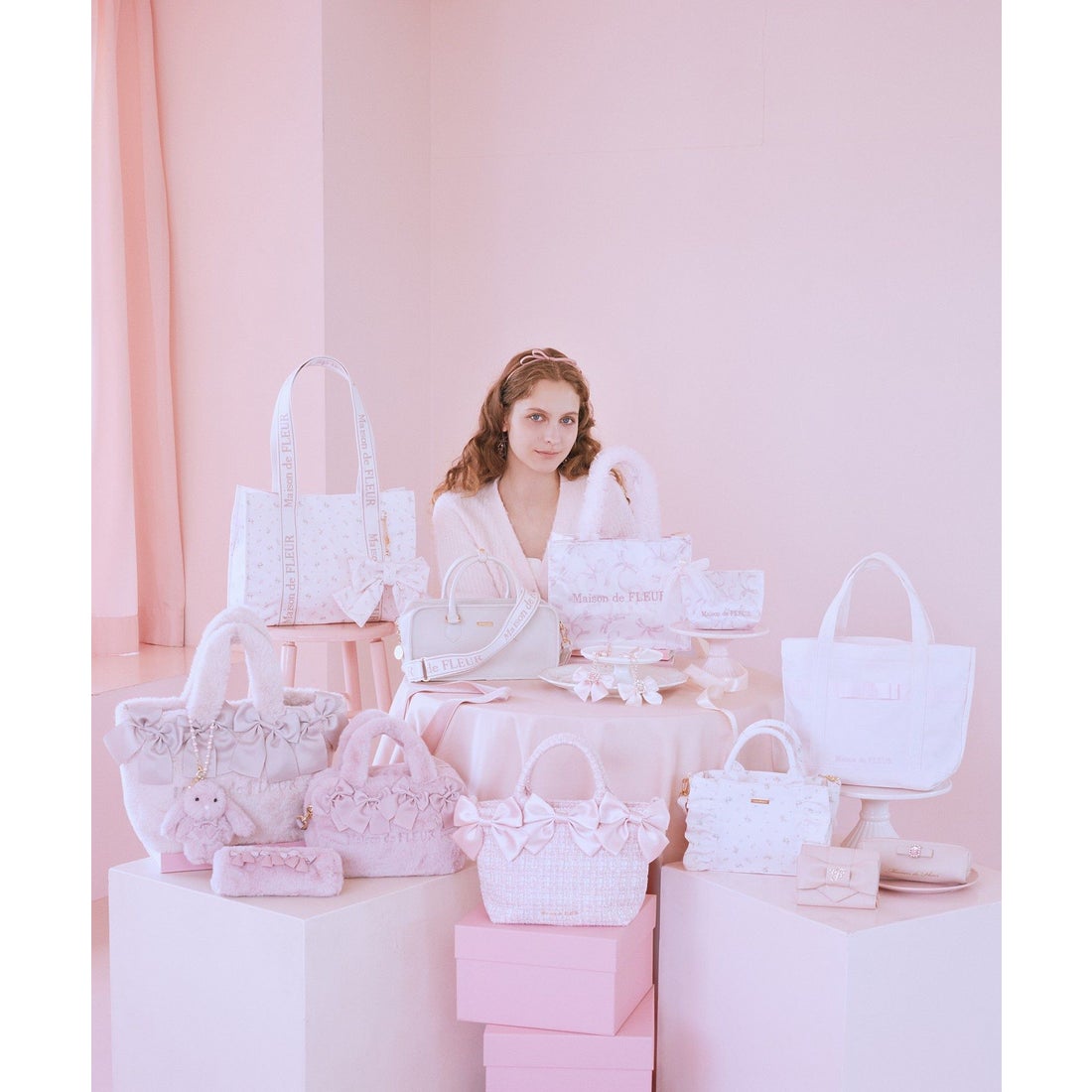 メゾン ド フルール Maison de FLEUR ピンクマニアファーロングポーチ