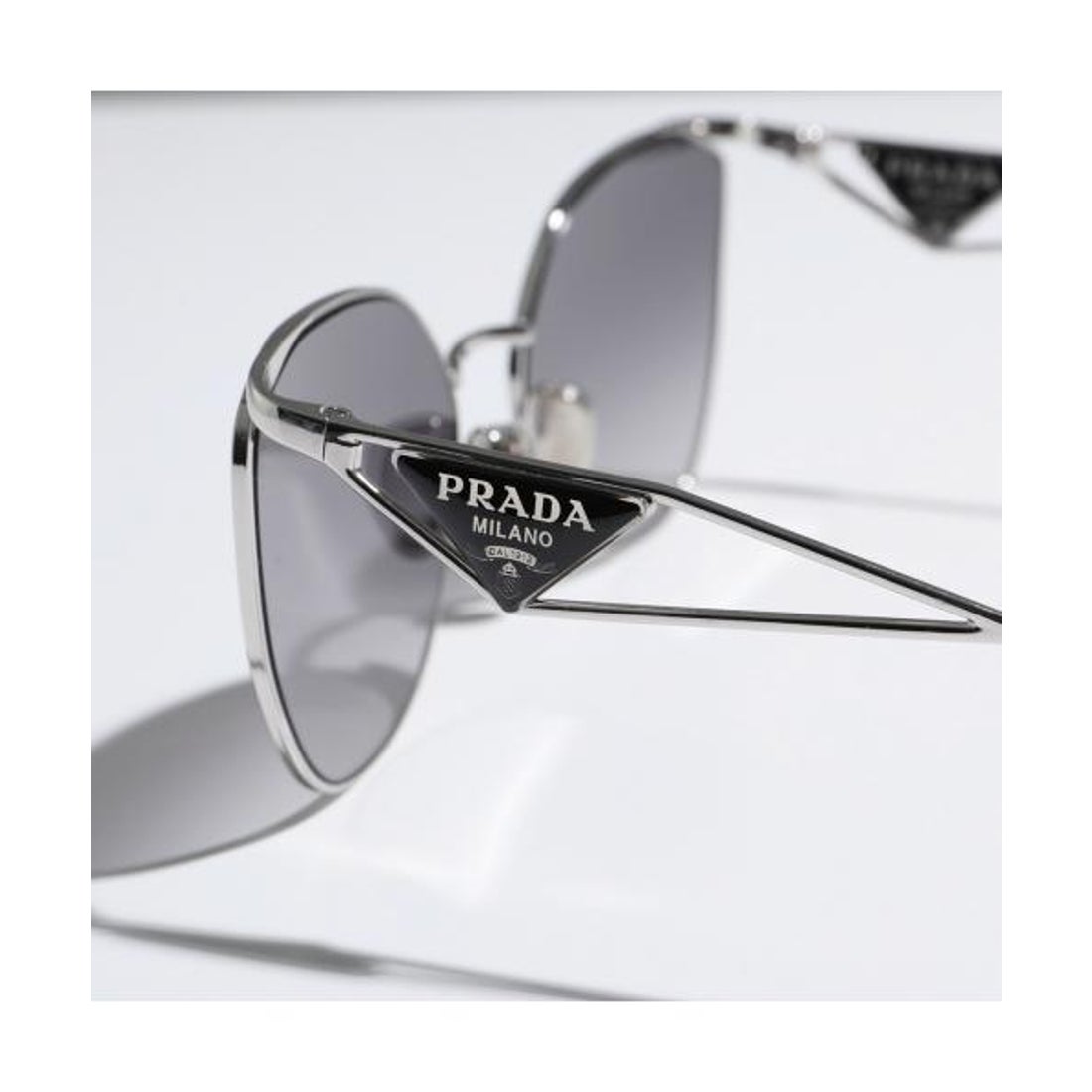 プラダ PRADA PRADA サングラス SPR50Z E1BC キャットアイ型 メタル