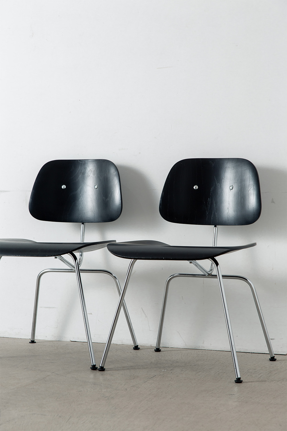 stoop | DCM Chair by Charles & Ray Eames for Herman Miller in