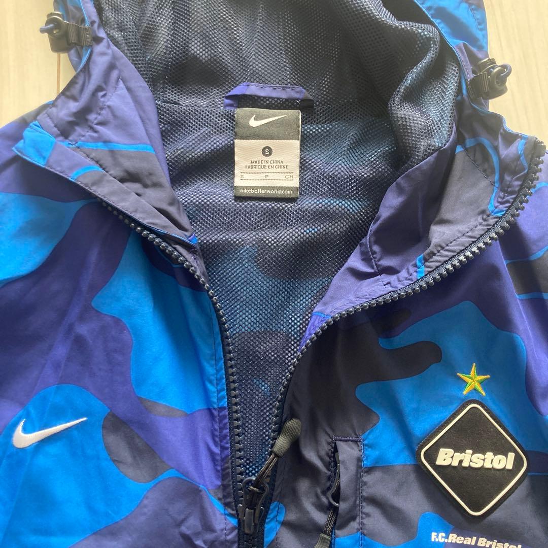 ぱき NIKE F.C.Real Bristol ナイロンジャケット 迷彩
