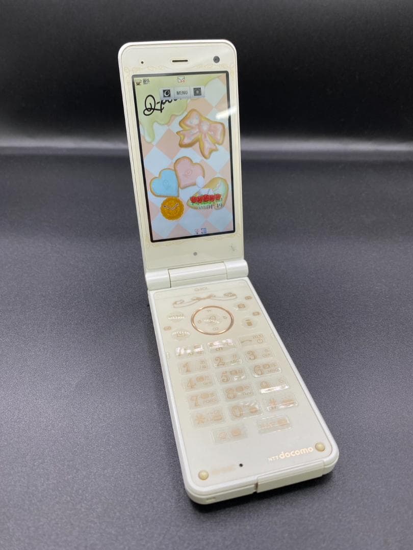 雨の日割り！docomo Q-POT SH04C ビスケット ガラケー - メルカリ