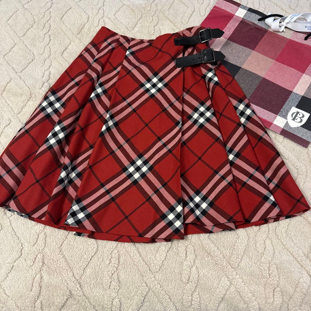 バーバリーブルーレーベル赤チェックベルト付き巻きスカート - メルカリ